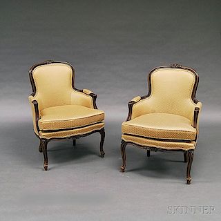 Pair of French Provincial-style Carved Fruitwood Bergeres
