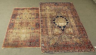 Two Antique Kerman Rugs
