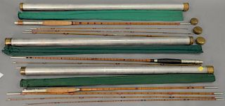 Three 3 part fly rods, all unsigned, two with short tips, all with metal cases.