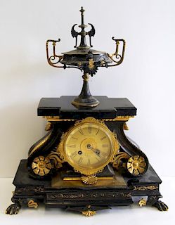 French Bronze and Marble Clock with Urn Finial.
