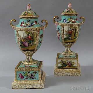 Pair of German Porcelain Covered Urns with Bases