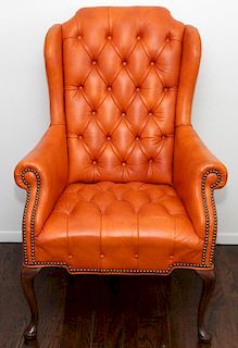 ORANGE QUEEN ANN STYLE TUFTED LEATHER ARM CHAIR
