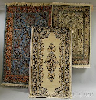 Three Oriental Rugs