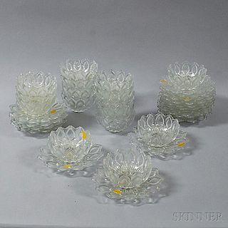 Set of Sixteen Colorless Glass Dessert Bowls and Underplates