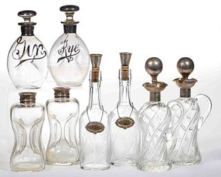 ENGLISH AND OTHER STERLING / SILVER AND GLASS DECANTERS, LOT OF FOUR PAIRS