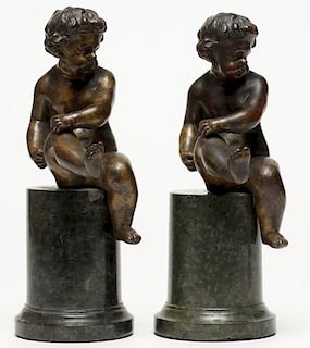 Pair of Gilt Bronze Cherubs Seated on Plinths