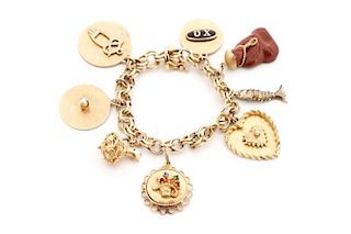 Ladies 14k Gold Multi-Charm Bracelet