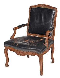 Louis XV Carved Walnut and Leather Upholstered Open Armchair