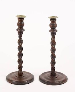 Pair of Stained Oak Barley Twist Candlesticks