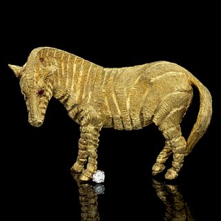 VINTAGE CRAIG DRAKE, ATTRIBUTED, 18K YELLOW GOLD, DIAMOND, AND RUBY FIGURAL ZEBRA BROOCH