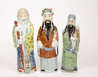 Three Chinese Porcelain Figures of Fu, Lu & Shou
