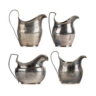 A Collection of Georgian Sterling Silver Cream Pitchers