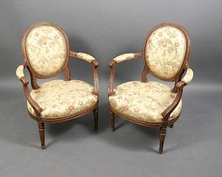 Pair of French LXVI Style Finely Carved Armchairs