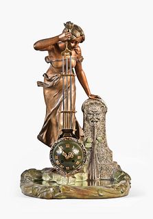 A good early 20th century French figural swinging clock after Aristide de Ranieri