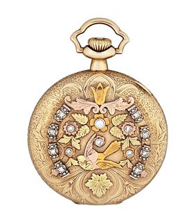 An early 20th century diamond and four color gold pocket watch retailed by Anna Silveira