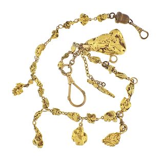 A heavy gold nugget watch chain