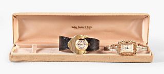 A lot of two lady's gold wrist watches