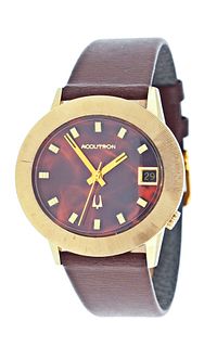 A 14 karat gold Bulova Accutron wrist watch