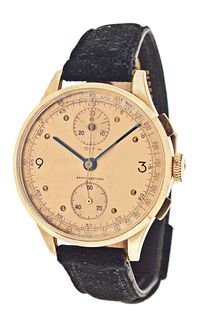 A mid 20th century gold wrist chronograph with Venus 170 movement