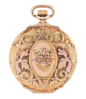 An early 20th century Longines pocket watch with very decorative three color gold case