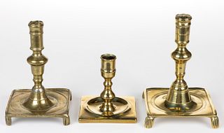 ASSORTED EUROPEAN BRASS SQUARE-BASE CANDLESTICKS, LOT OF THREE