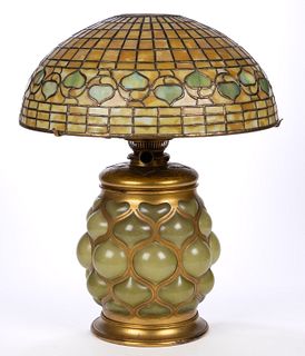 EARLY TIFFANY STUDIOS ACORN LEADED AND FAVRILE GLASS KEROSENE TABLE LAMP