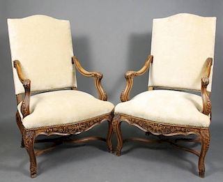 Pair of French Regence Style Walnut Fauteuils