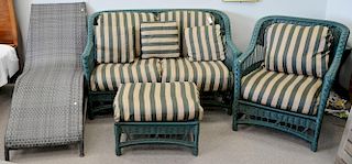 Green wicker style four piece set to include loveseat (lg. 56in.), large armchair with ottoman, and a contemporary chaise (lg