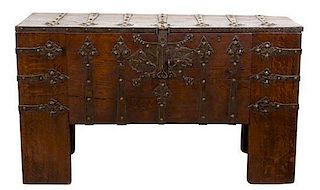 A German Gothic Iron-Mounted Oak Chest "Stollentruhe" Height 34 x length 59 x depth 20 1/2 inches.