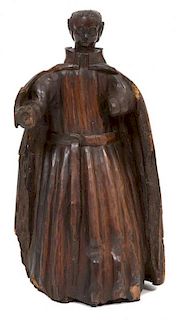An Italian Carved Walnut Figure of a Clergyman Height 19 inches.