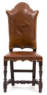 An Italian Renaissance Style Leather Upholstered Side Chair Height 43 inches.