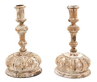 A Pair of Italian Carved and Painted Wood Candlesticks Height 10 1/2 inches.