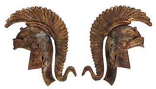 A Pair of Italian Parcel Gilt Carved Wood Helmet-Form Wall Plaques Height 18 1/4 inches.