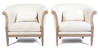 A Pair of Louis XVI Style Upholstered Bergeres Height 34 x width 38 x depth 32 inches.