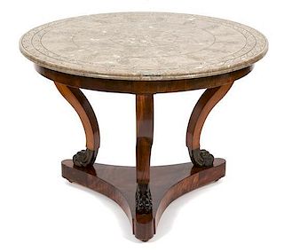 A Louis Philippe Style Center Table Height 28 x diameter 39 inches.