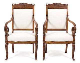 A Pair of Louis Philippe Burl Walnut Swan Crested Armchairs Height 39 x width 23 x depth 18 1/2 inches.