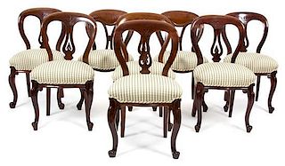 Eight Louis Philippe Style Balloon Back Chairs Height 34 1/2 inches.