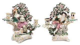 A Pair of German Porcelain Figural Candlesticks Height 11 1/2 inches.