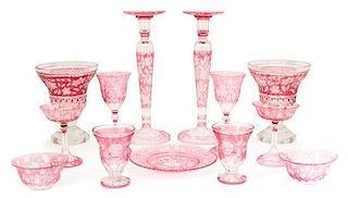 A Collection of Cranberry Cut-to-Clear Glass Height of tallest 14 1/4 inches.