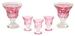 A Collection of Cranberry Cut-to-Clear Glass Height of vase 8 1/2 inches.