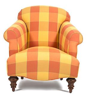 An Upholstered Armchair Height 41 x width 29 x depth 35 inches.