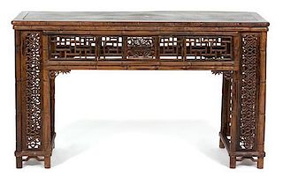 A Chinese Carved Elmwood Console Table Height 35 x width 58 x depth 18 3/4 inches.