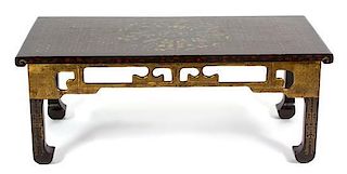 A Chinese Black Lacquer and Gilt Painted Low Table Height 20 x width 52 x depth 25 1/2 inches.
