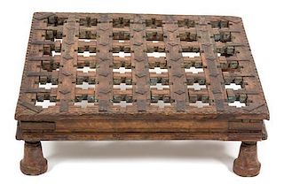 An Indian Carved Wood Low Table Height 7 x width 22 x depth 22 inches.