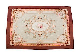 An Aubusson Tapestry Rug 13 feet x 5 feet 4 inches.