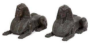 A Pair of Continental Bronze Sphinxes Length 22 inches.