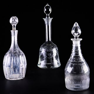 Group of Three Cut Glass Decanters and Stoppers