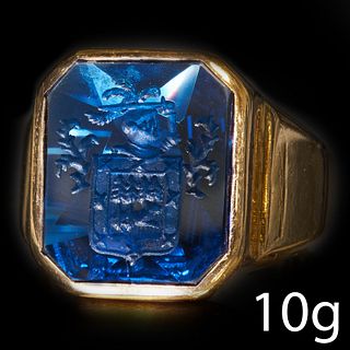 A CARVED BLUE STONE INTAGLIO RING