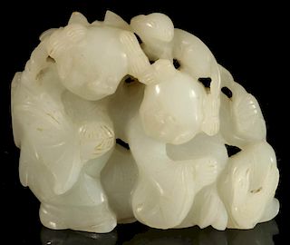 A SMALL CHINESE CARVED JADE GROUPING