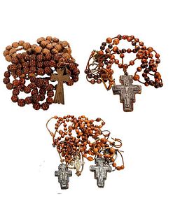 A Collection of Vintage Souvenir Wood Rosaries.